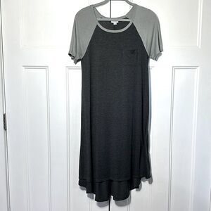 Lularoe 
* Carly short sleeve swing dress
* High-low hemline, patch pocket